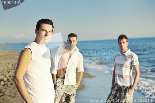 Image of young man at beach