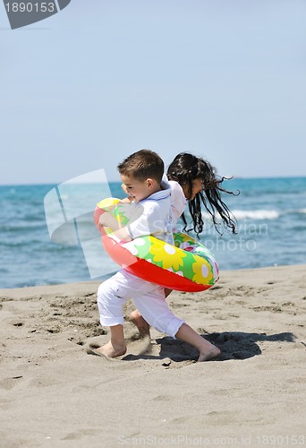 Image of happy young  people group have fun on beach