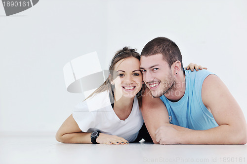Image of happy young couple fitness workout and fun