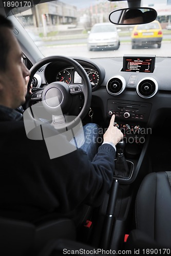 Image of man using car navigation