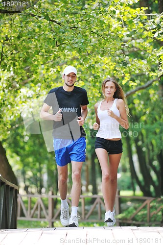 Image of couple jogging outdoor