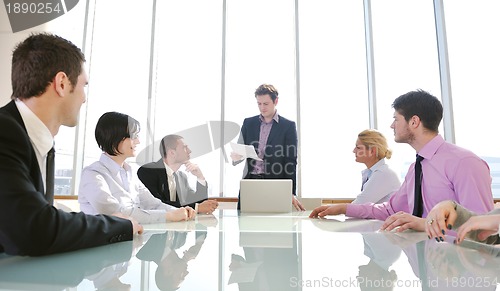 Image of group of business people at meeting