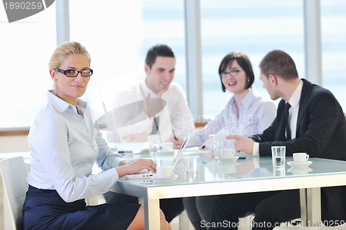 Image of group of business people at meeting