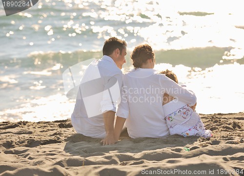 Image of happy young  family have fun on beach