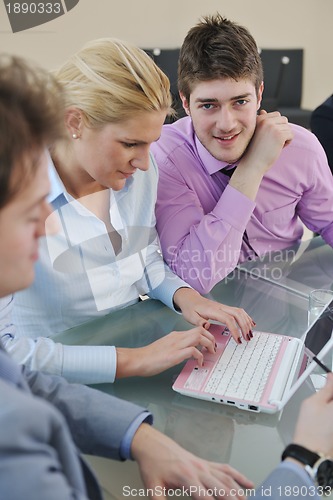 Image of group of business people at meeting