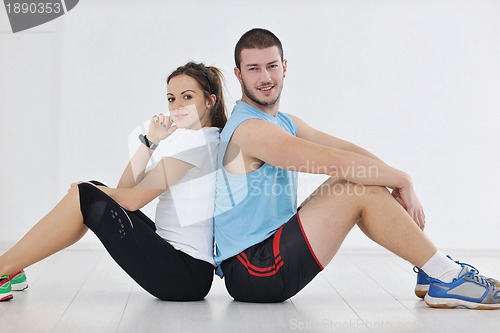 Image of happy young couple fitness workout and fun