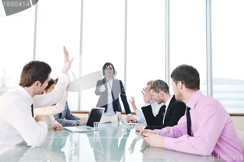 Image of group of business people at meeting