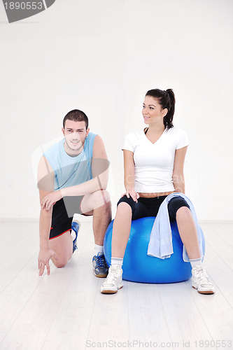 Image of happy young couple fitness workout and fun