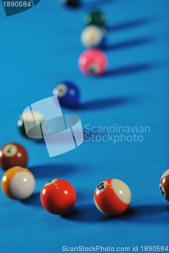 Image of young man play pro billiard game 