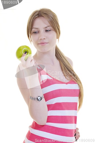 Image of happy  young  woman eat green apple isolated  on white