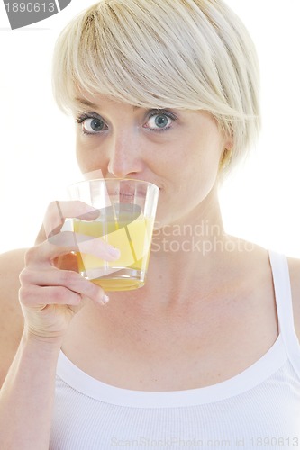 Image of Young woman drinking orange juice isolated over white background