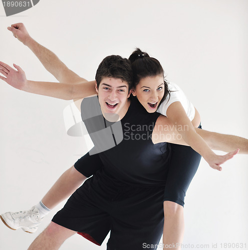Image of happy young couple fitness workout and fun