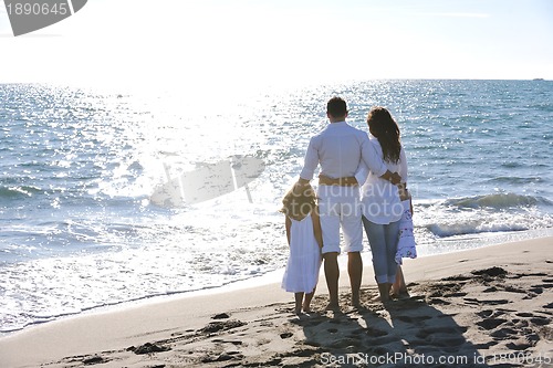 Image of happy young  family have fun on beach