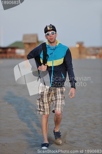 Image of man relax on beach