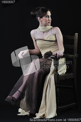 Image of  young woman in beautiful luxury dress