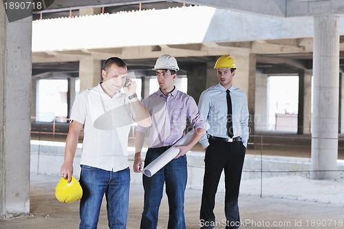 Image of Team of architects on construciton site