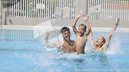 Image of happy young family have fun on swimming pool