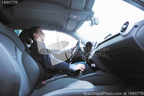 Image of man using car navigation