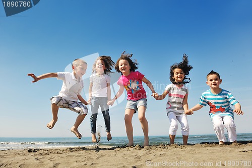 Image of happy young  people group have fun on beach
