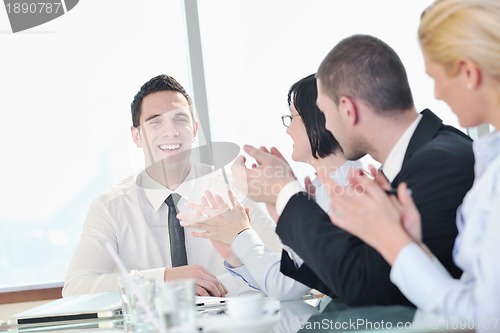 Image of group of business people at meeting