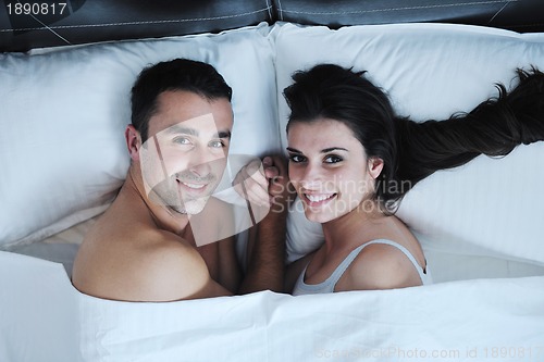 Image of young couple have good time in their bedroom