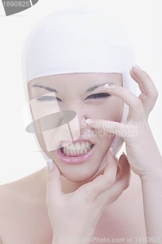 Image of woman face surgery