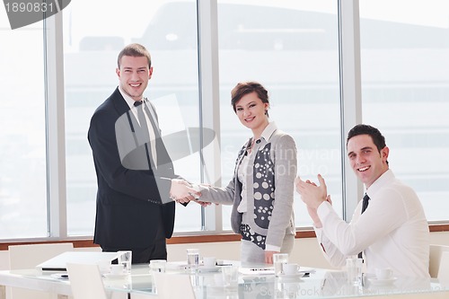 Image of group of business people at meeting