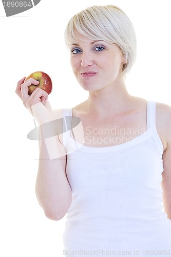 Image of happy  young  woman eat green apple isolated  on white