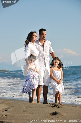 Image of happy young  family have fun on beach
