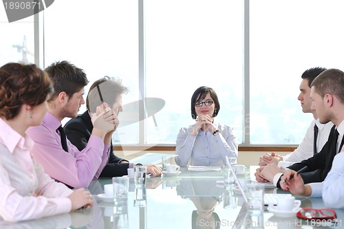 Image of group of business people at meeting