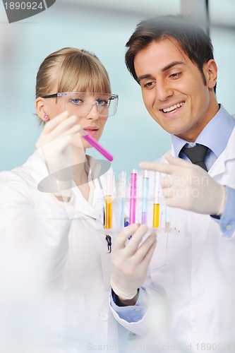 Image of science people in bright lab