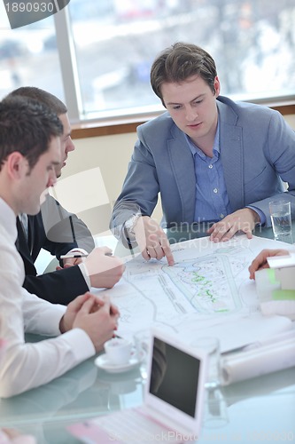 Image of group of business people at meeting