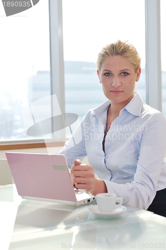 Image of young business woman on meeting