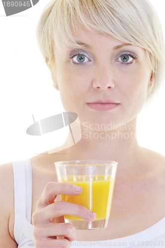 Image of Young woman drinking orange juice isolated over white background