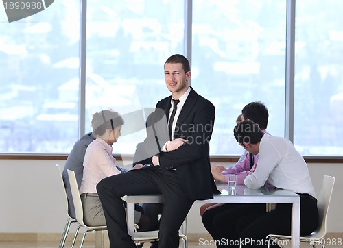 Image of group of business people at meeting