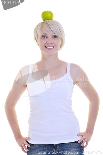 Image of happy  young  woman eat green apple isolated  on white