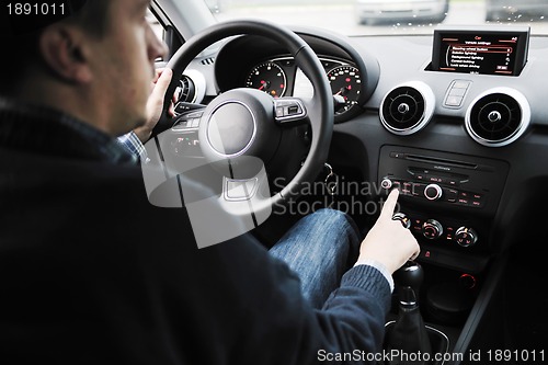 Image of man using car navigation