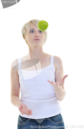 Image of happy  young  woman eat green apple isolated  on white