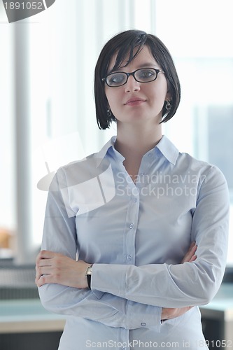 Image of young business woman on meeting