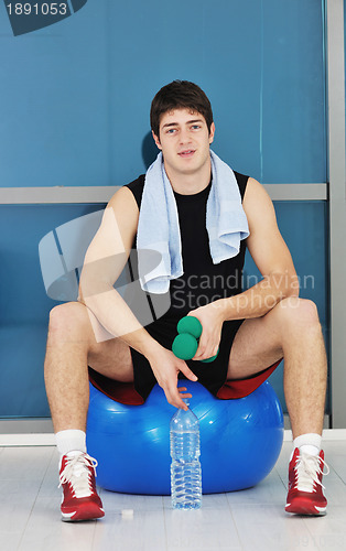 Image of man drink water at fitness workout