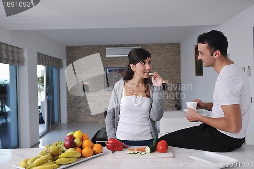 Image of young couple have fun in modern kitchen