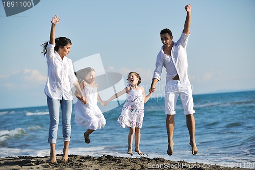 Image of happy young  family have fun on beach