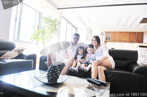 Image of young family at home