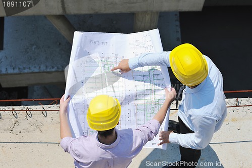 Image of Team of architects on construciton site