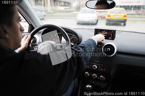 Image of man using car navigation