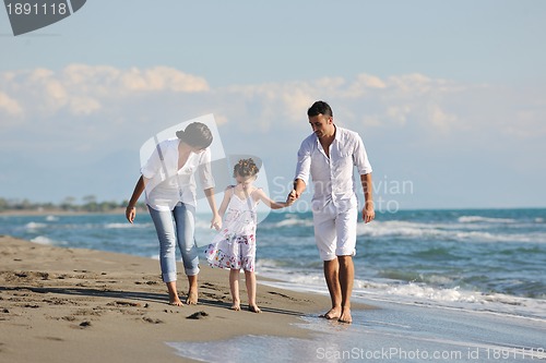 Image of happy young  family have fun on beach