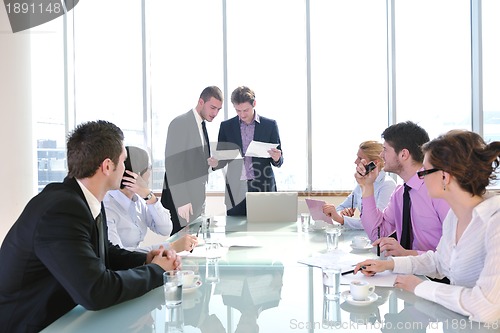 Image of group of business people at meeting