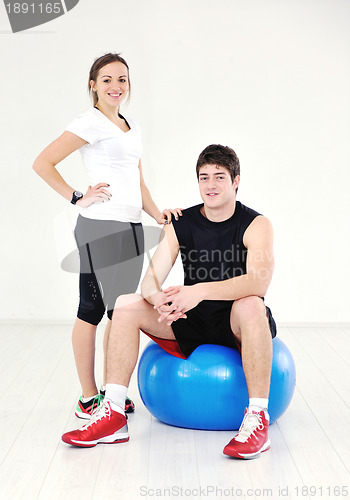 Image of happy young couple fitness workout and fun