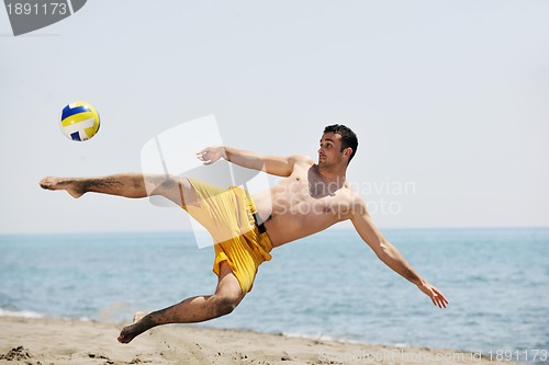 Image of male beach volleyball game player