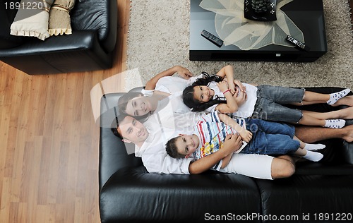 Image of young family at home